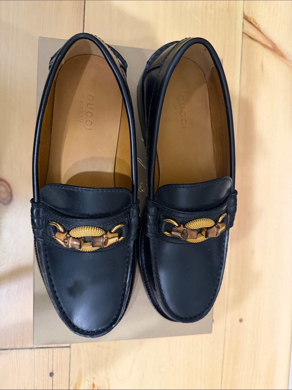 Gucci Black Leather Loafers with Gold Horsebit Accent